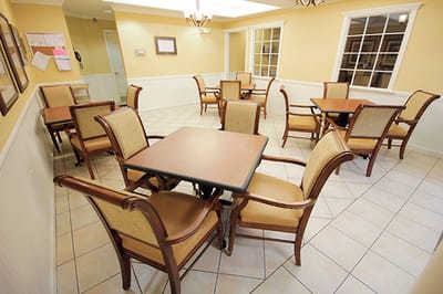 Bright common area with tables and chairs