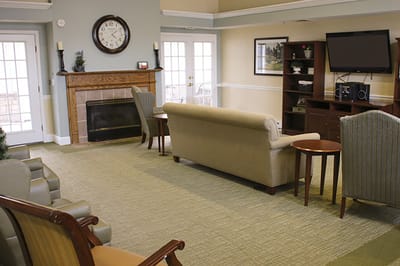Cozy common area with seating and fireplace