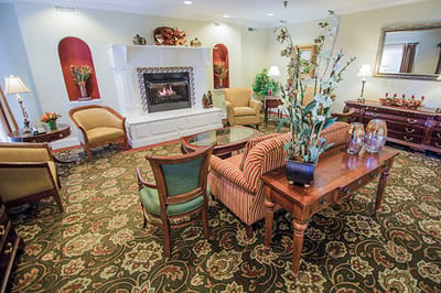 Interior common area with seating and fireplace