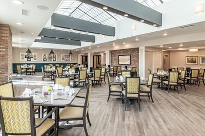 Bright dining area with tables set for meals