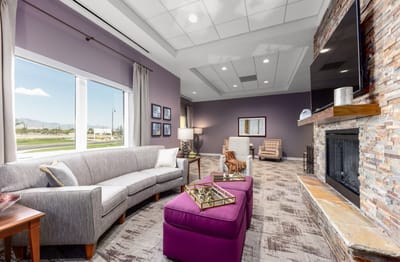 Bright and inviting common area with seating and decor