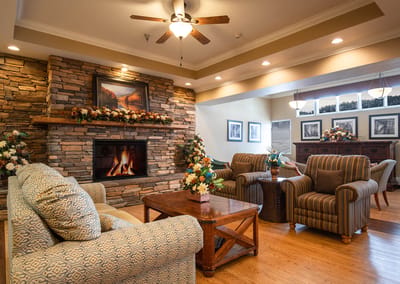 Cozy common area with a fireplace and seating