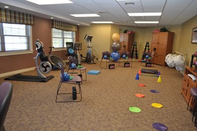 Interior fitness room with exercise equipment
