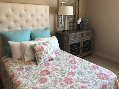 Cozy resident room with a floral bedspread