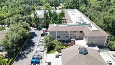 Aerial view of facility building and surrounding area