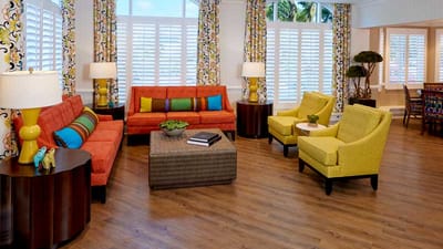 Brightly decorated common area with colorful furniture