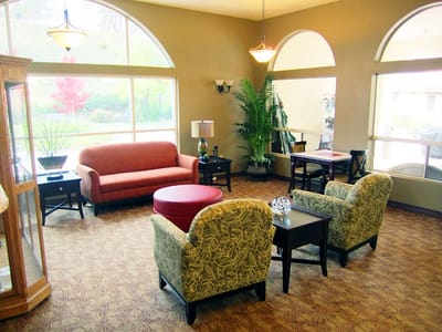 Common area with seating and large windows