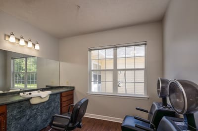 Interior shot of the salon area with styling chairs