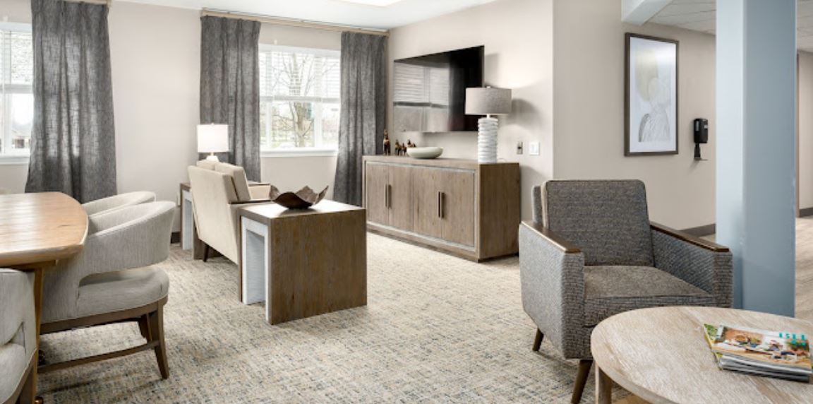 Bright and modern common area with seating and decor