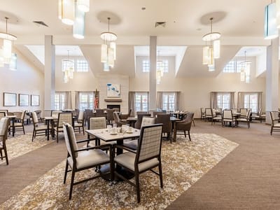 Spacious dining area with tables and chairs