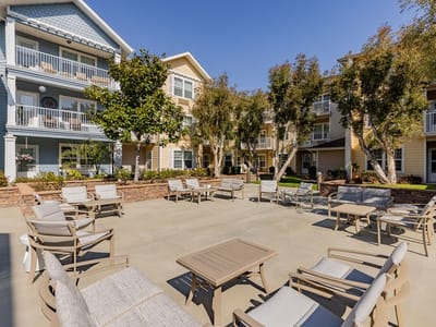Outdoor seating area with landscaped surroundings