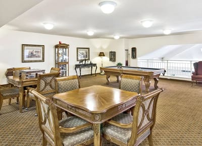 Common area with seating and a pool table