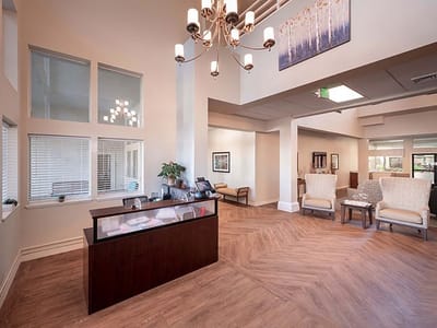 Bright common area with seating and natural light
