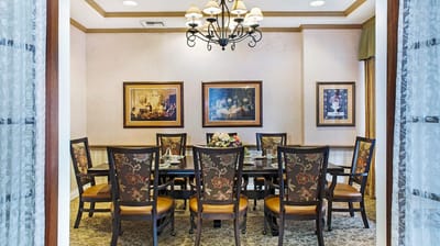 Interior view of a dining room with a large table