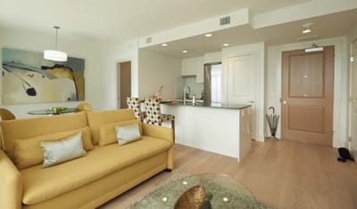 Interior view of a comfortable living space with a kitchen