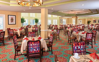 Dining room with set tables and colorful decor
