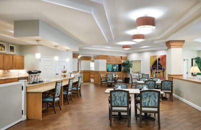Bright common area with seating and art decoration