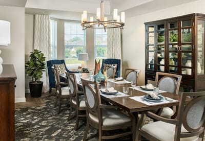 Elegant dining room setup with a large table and decor