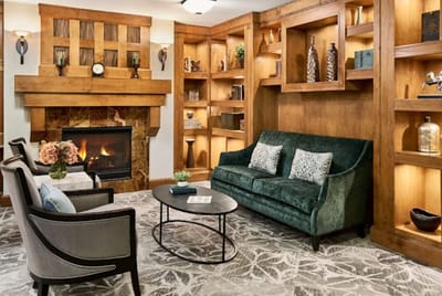 Cozy common area with seating and a fireplace