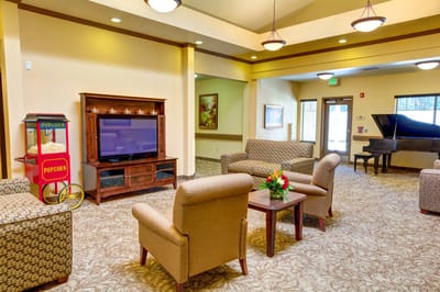 Cozy common area with seating and a TV