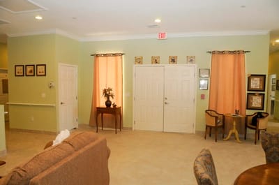 Bright common area with seating and decorative features
