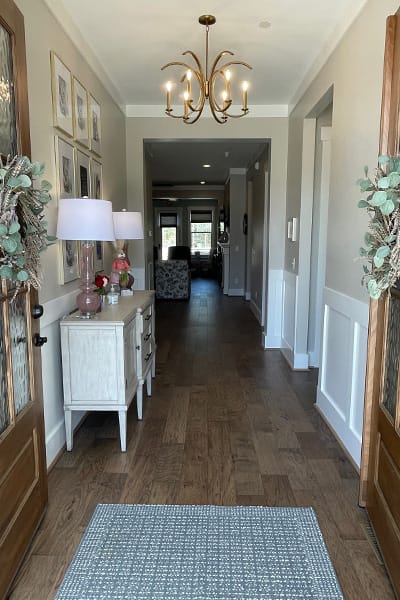 Interior hallway featuring decor and lighting