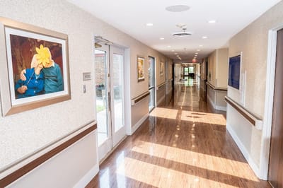 Bright and spacious hallway showcasing art and light