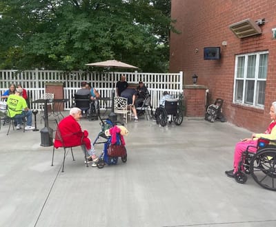 Residents enjoying the outdoor patio area