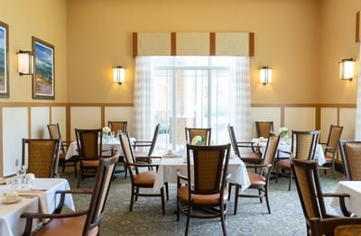 Dining area with tables set for a meal