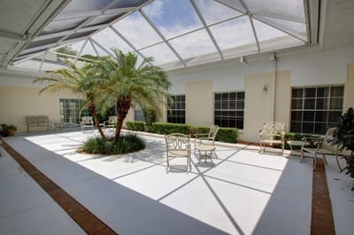 Outdoor courtyard with seating and greenery