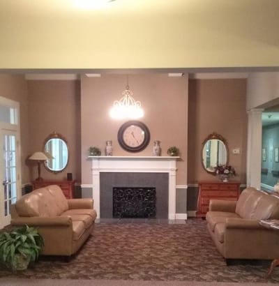 Cozy common area with seating and fireplace
