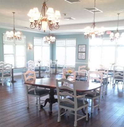 Bright dining room with elegant lighting and tables