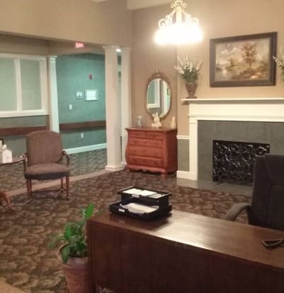 Interior common area with seating and fireplace