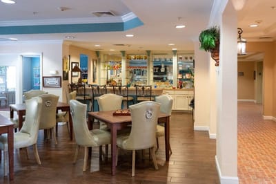 Bright common area with seating and display shelf