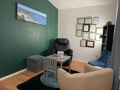 Comfortable seating in a common room with decor