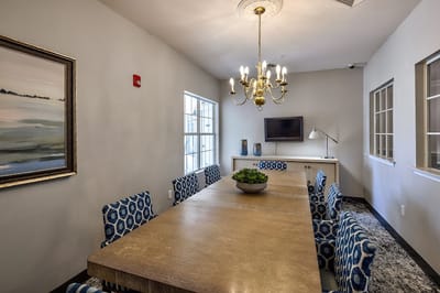 Interior view of a dining room with a large table