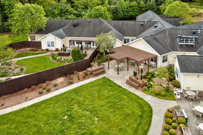 Aerial view of landscaped outdoor space with pathways and seating.