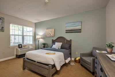 Cozy private resident room with a bed and decor