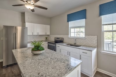Bright kitchen area with modern appliances