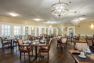 Dining area with tables and chairs arranged