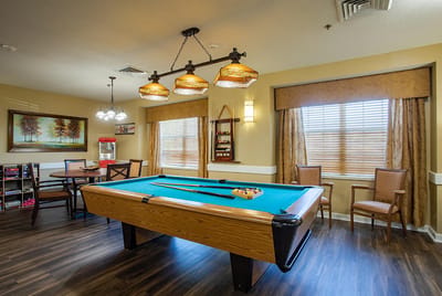 Interior view of a common area with a pool table