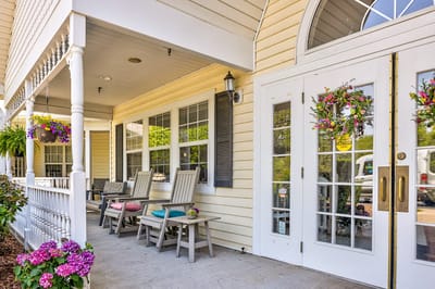 Front entrance with seating and flower decorations