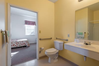 Interior view of a resident bathroom and bedroom area