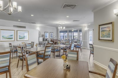 Dining room area with tables and chairs set up