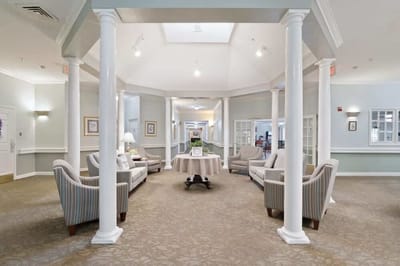 Interior view of a bright common area with seating