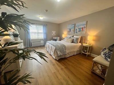 Bright, furnished resident room with cozy decor