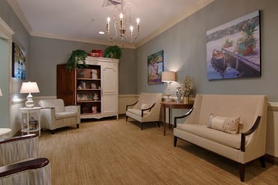 Bright common area with seating and artwork