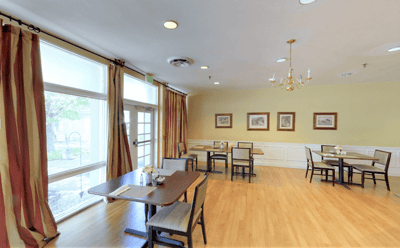 Bright dining room with tables and chairs