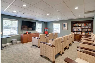 Interior view of a community activity room with seating