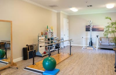 Interior therapy room with equipment and seating